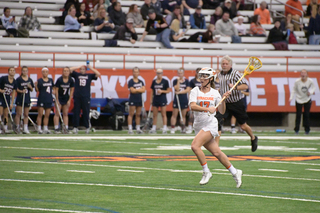 Riley Donahue initiates the offensive rush for Syracuse. 